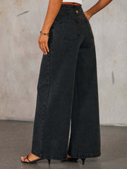 Dark wash denim palazzo pants with button detail and wide leg
