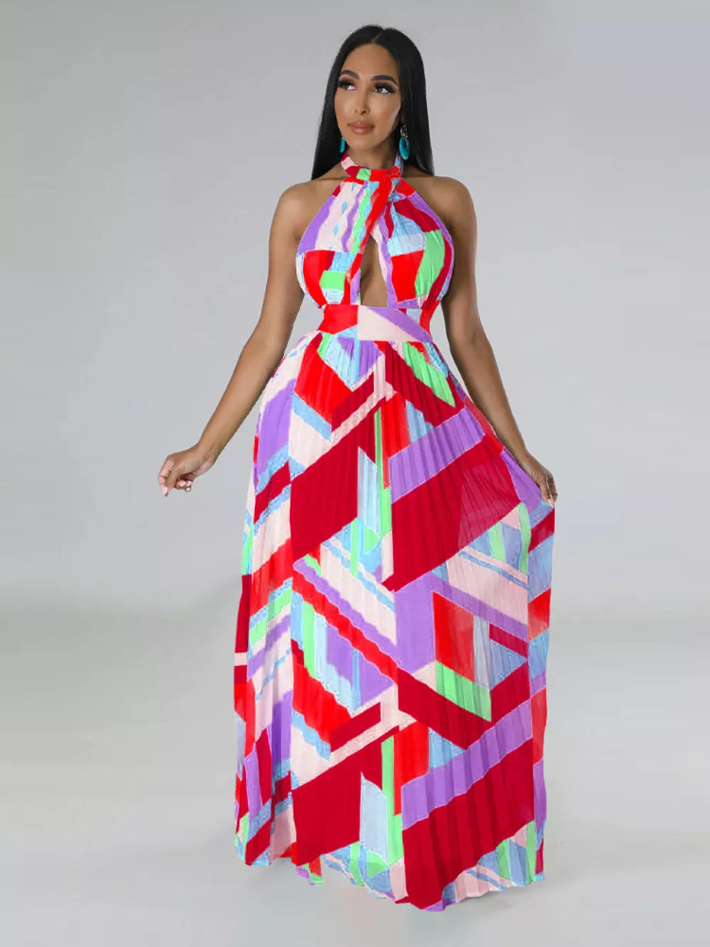 Halter neck maxi dress with geometric print and pleats in red, blue, green, and purple.
