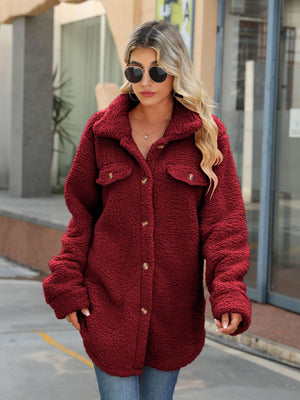 Wine teddy-texture button-down shacket with two chest pockets and button closure.