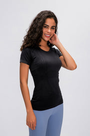 Black activewear seamless tee with short sleeves and subtle textured details.