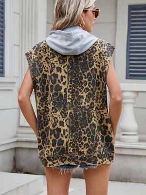 Leopard print denim utility vest with a grey removable hood, sleeveless.