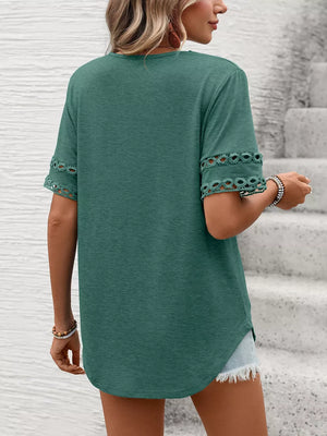 Dark green V-neck t-shirt with lace trim on the sleeves.