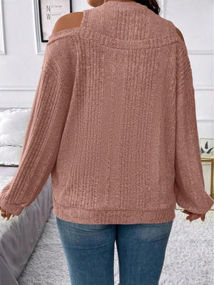 Dusty pink ribbed mock neck cold shoulder knit top with long sleeves.