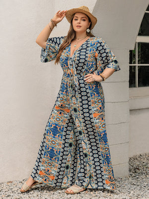 Bohemian palazzo jumpsuit in Peacock Blue with tie-front, V-neck, and bell sleeves.