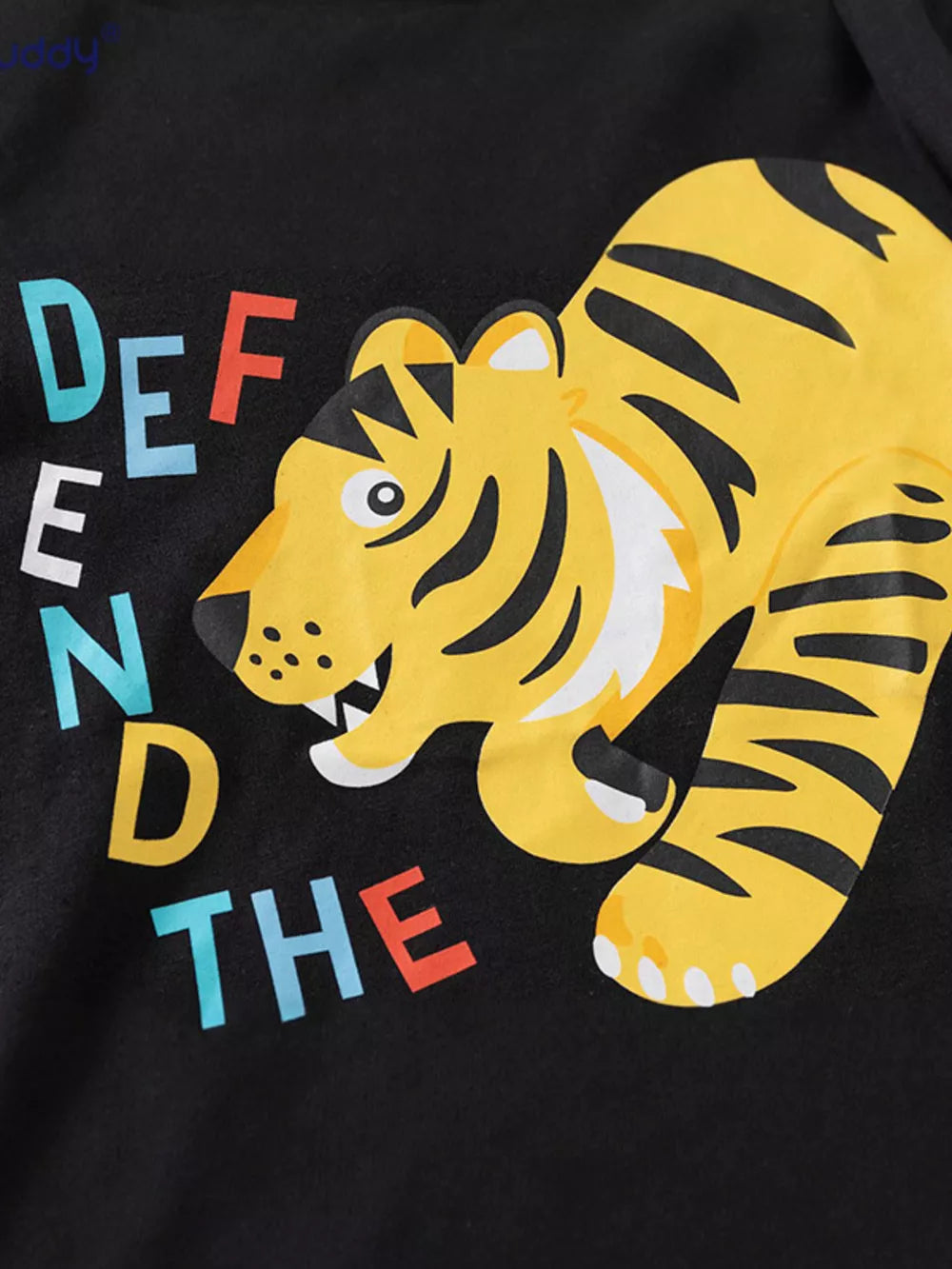 Black cotton baby tee with a yellow tiger graphic and colorful text.