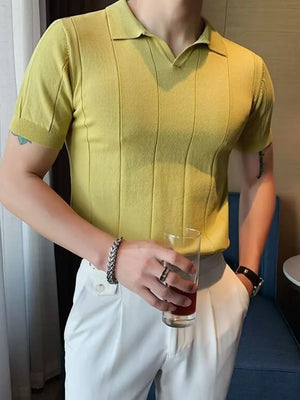 Light yellow textured knit polo shirt with vertical ribbing and short sleeves.