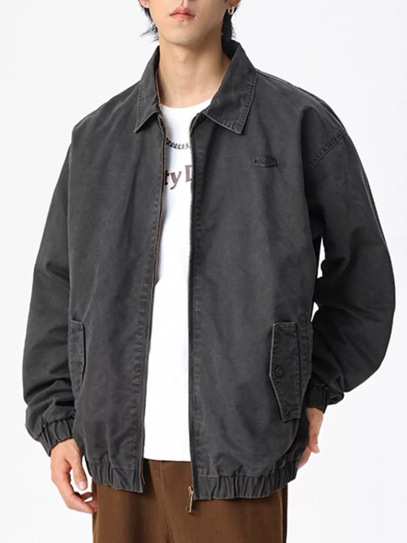 Men's dark gray cotton casual zip jacket with collar and button flap pockets.