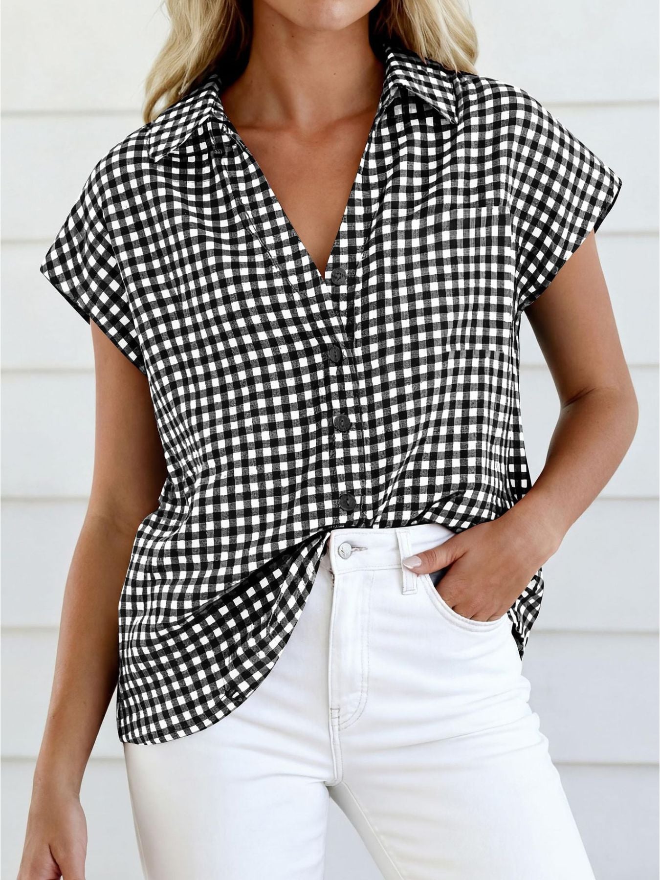 Black gingham print button-down shirt with short sleeves and a V-neckline.