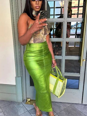 Glistening lime green high-waisted maxi skirt with a bodycon fit and ruched detailing.