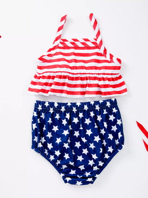Baby outfit set with red and white striped halter top and bloomer bottoms with white stars on navy.