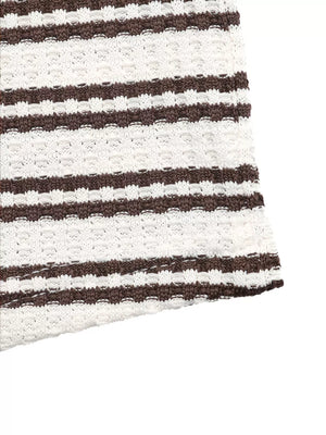 Waffle-knit polo t-shirt with brown and cream horizontal stripes and textured knit detail.