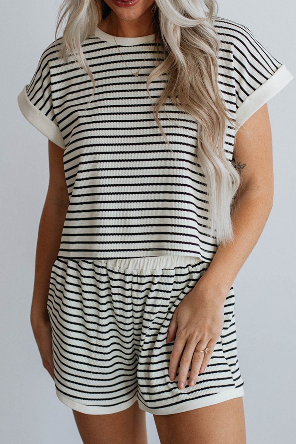 Ribbed stripe tee and shorts set with cuffed sleeves and elastic waist shorts.
