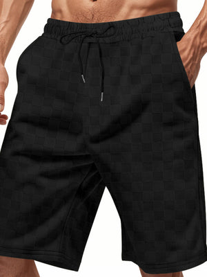 Black checkered chino shorts with drawstring waist and pockets.