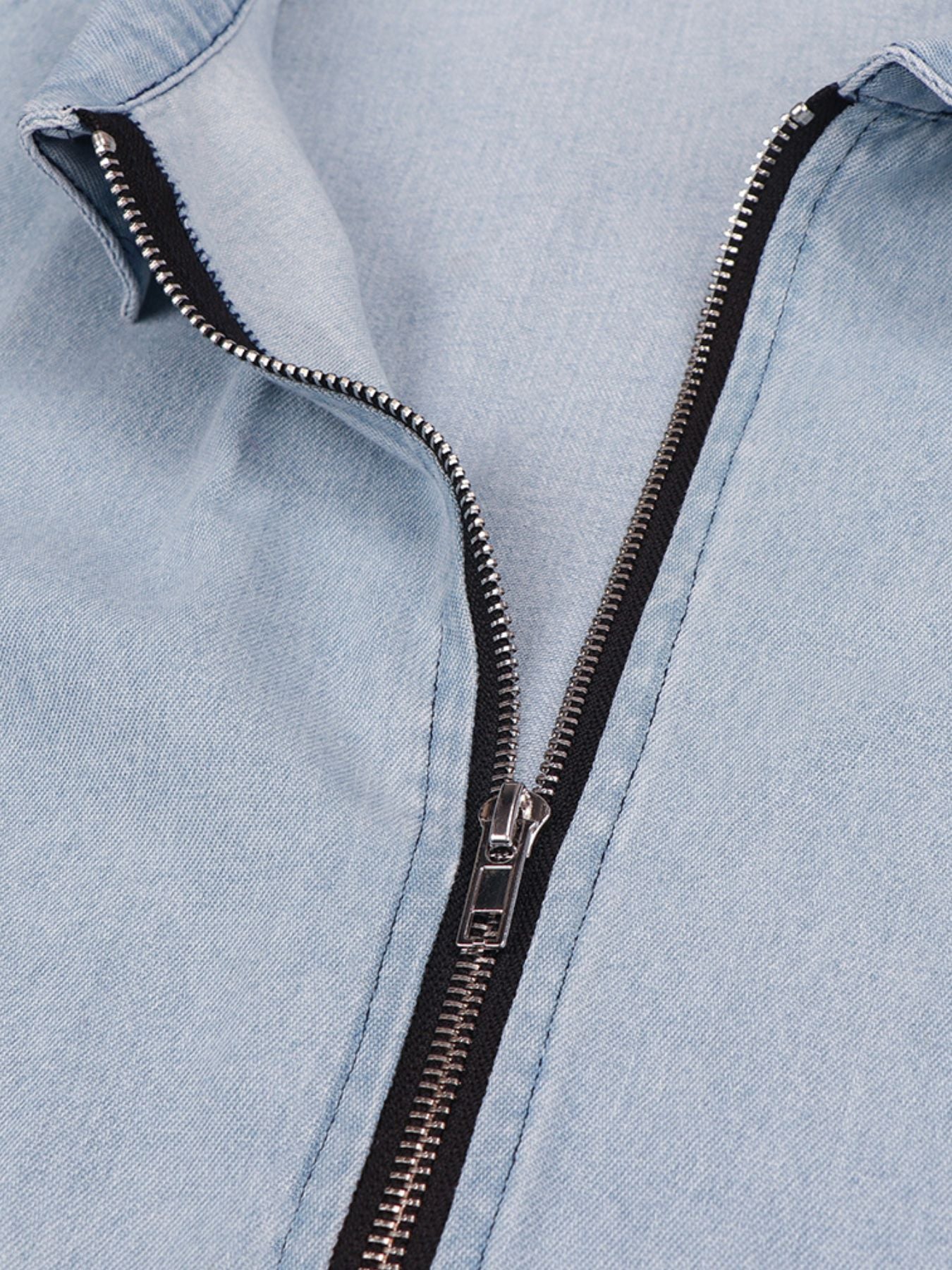 Light wash denim mini dress with a silver zipper front detail