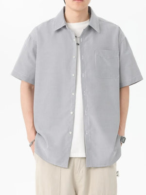 Button-down Oversized Short-sleeve Top in Blue, front view