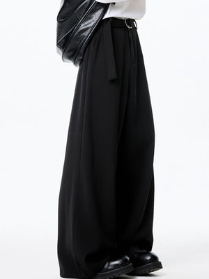 Men's black wide-leg casual pants with belted waist and silver buckle detail.
