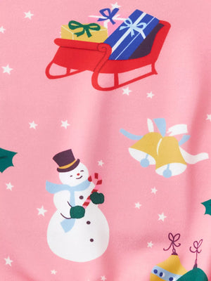 Pink crew neck sweatshirt with festive Christmas print of snowman, sleigh, and bells.