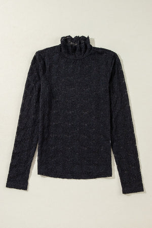 Black floral lace turtleneck top with ruffled neckline and long sleeves.