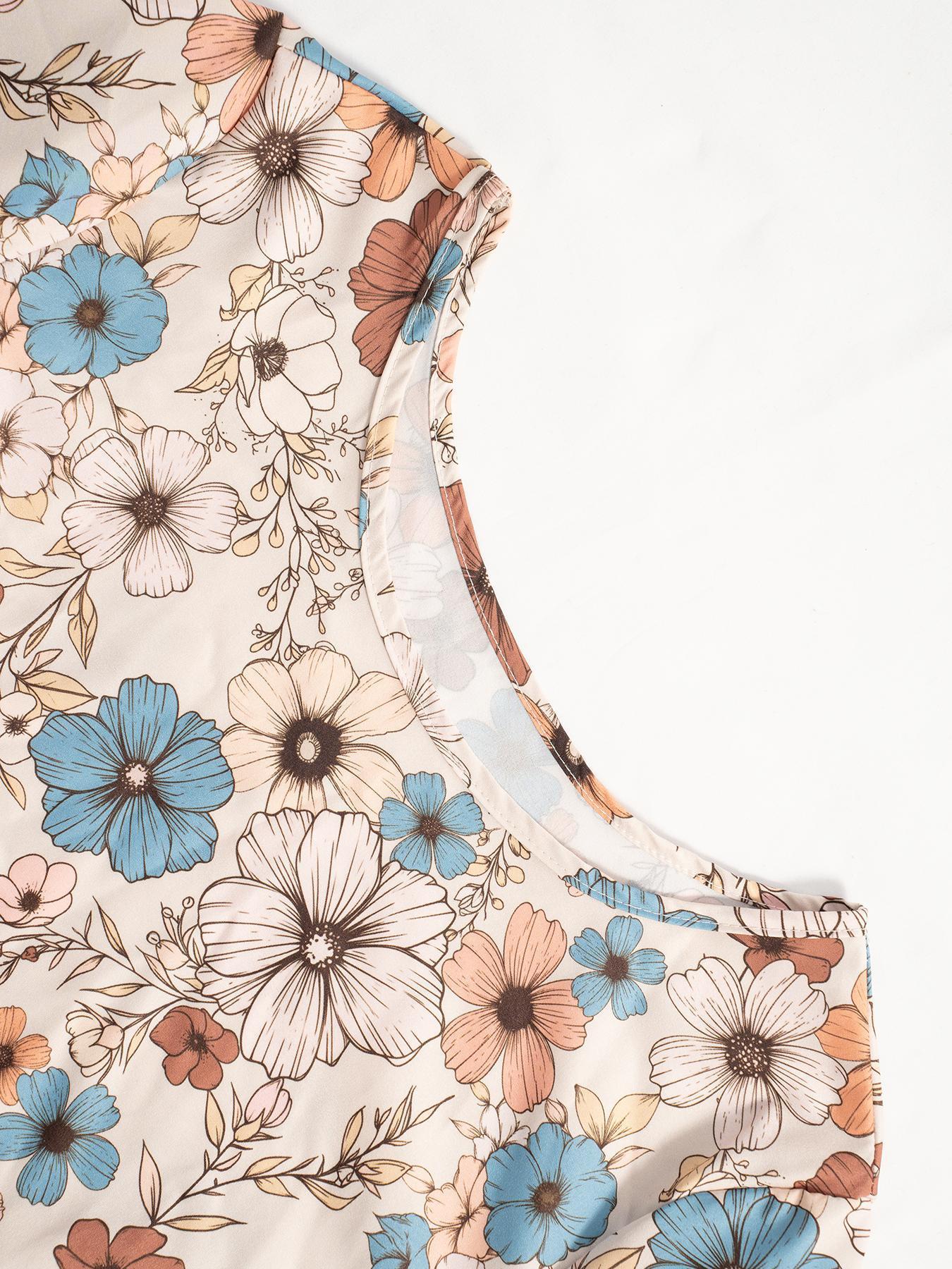 Charming floral tiered dress with long sleeves in beige, featuring a retro floral print and crew neck detail.