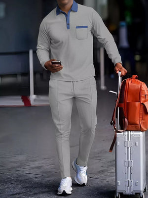 Men's gray two-piece lounge set with polo collar and chest pocket.