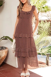 Charming ruffled polka dot maxi dress in brown polyester with a square neckline and short sleeves.