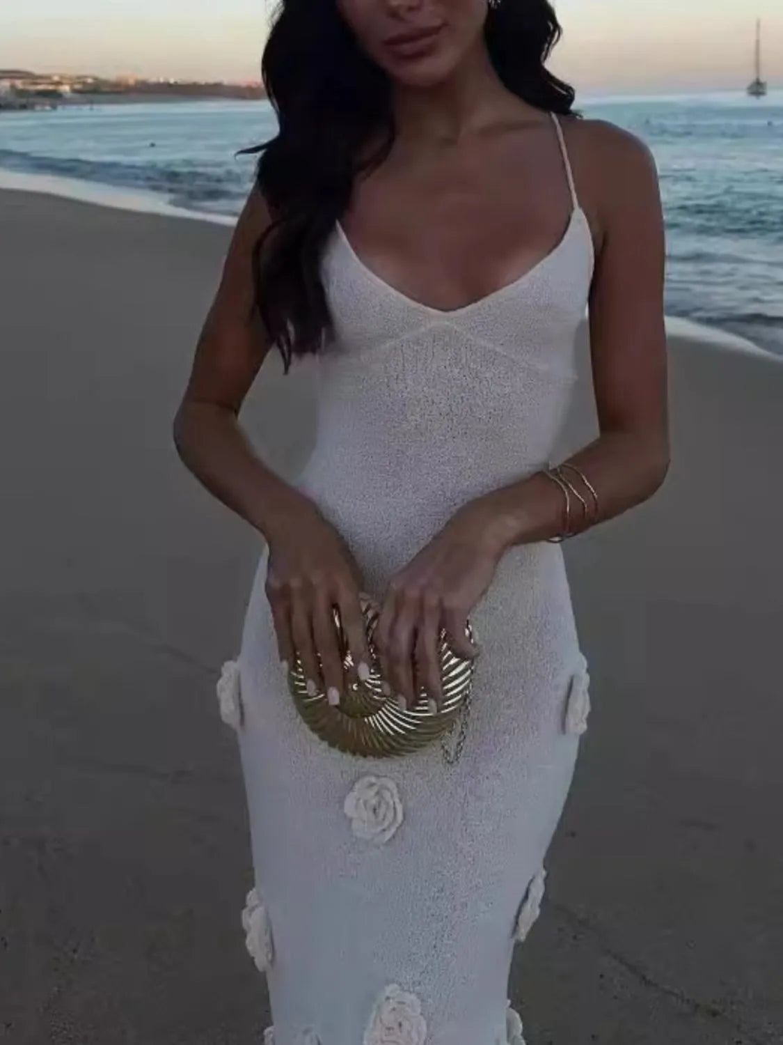White cami gown with rose appliqués and spaghetti straps