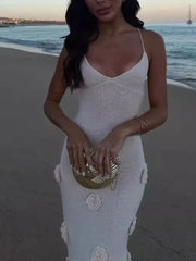 White cami gown with rose appliqués and spaghetti straps