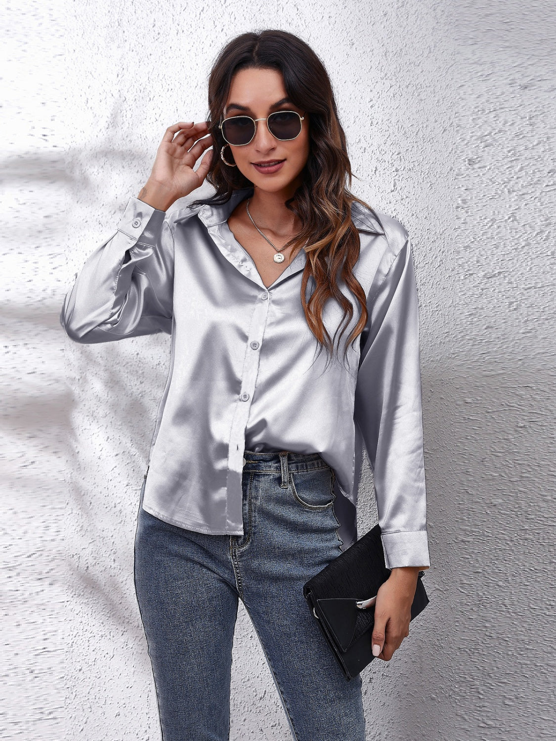 Silken button-down shirt in light gray with a relaxed fit, collared neckline, and button closures.