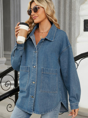 Medium wash oversized denim jacket with hood, button front, and chest pockets.