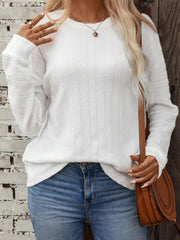 White textured chevron knit crewneck sweater with long sleeves.