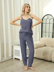 Dusty blue knit loungewear set with cami and drawstring pants.
