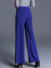 Blue high-waisted wide leg cotton trousers with pockets, elegant and comfortable.