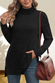 Black ribbed knit turtleneck tunic top with long sleeves and side slits.