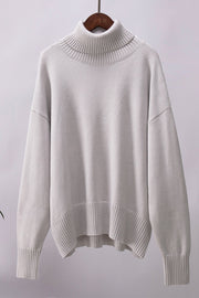 Light Gray relaxed roll-neck sweater with a boxy knit and ribbed details.