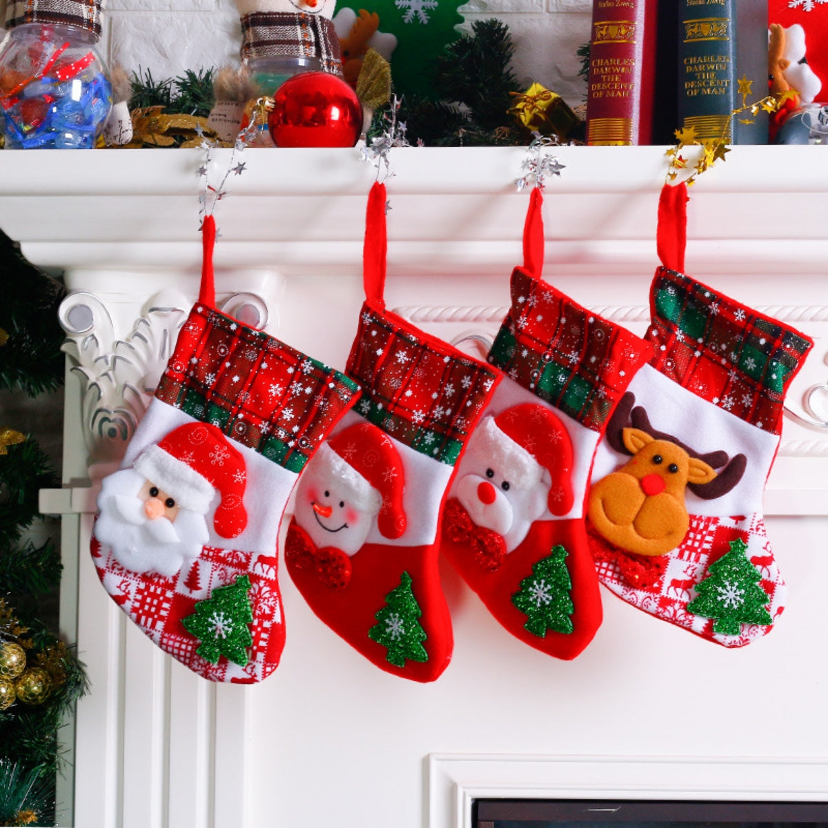 Festive Christmas stockings with Santa, snowman, and reindeer designs.