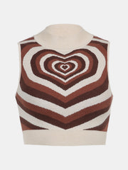 Brown knit tank top with a white and brown concentric heart intarsia pattern and mock neck.
