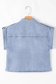 Light blue denim shirt jacket with rolled sleeves and shoulder epaulets.