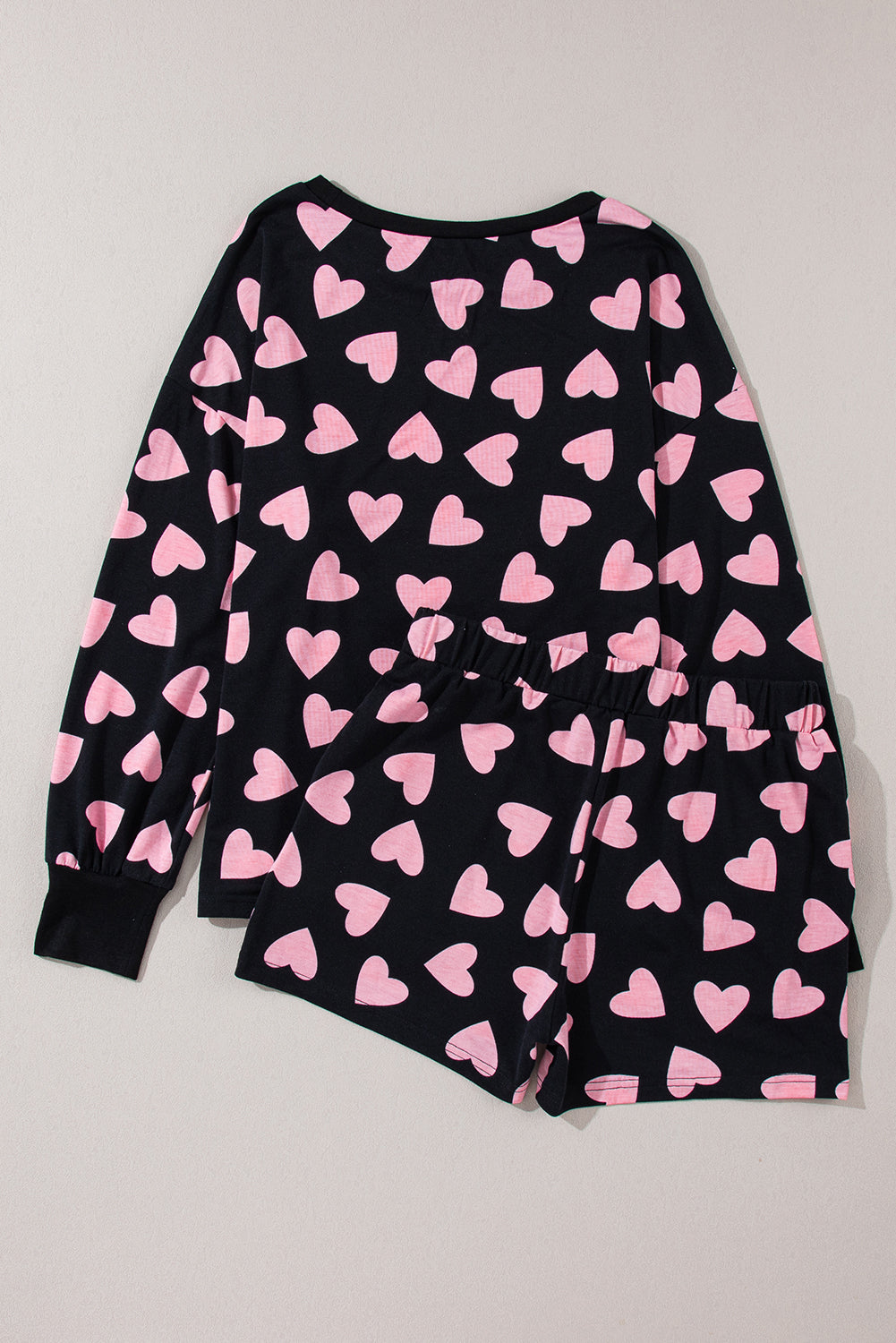 Black heart print pajama set with long sleeve top and shorts