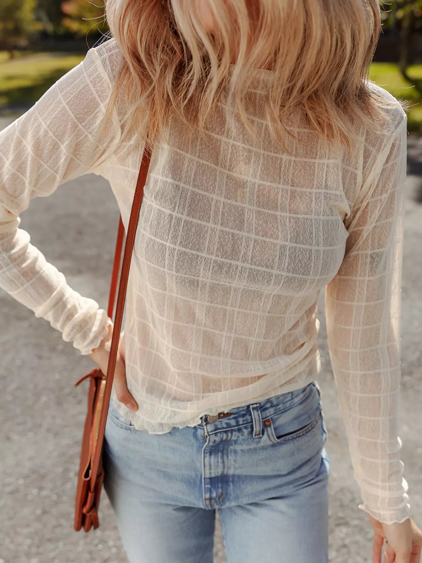 Sheer plaid long-sleeve top in beige with a slim fit and lettuce hem detail.