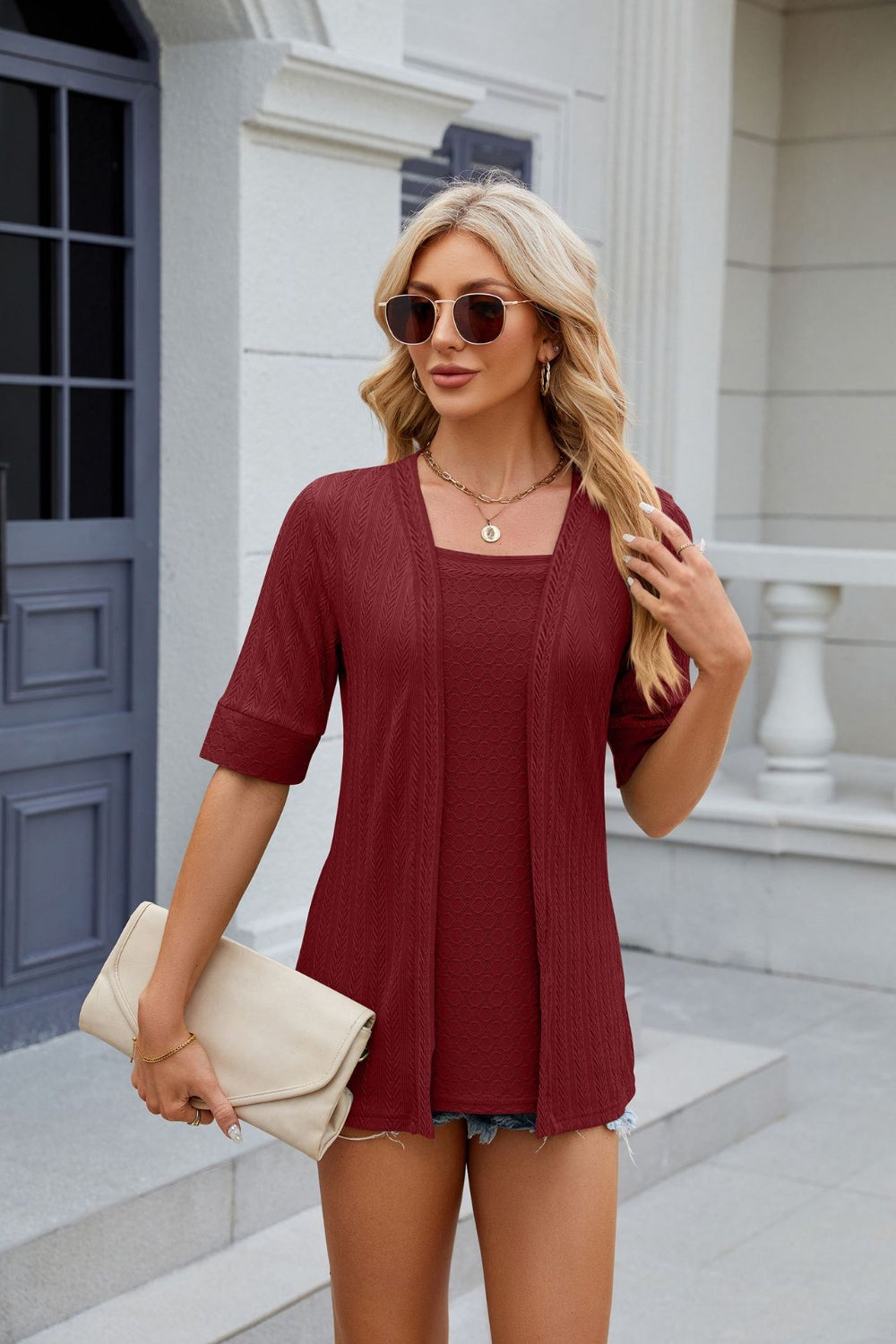 Burgundy textured layered square neckline blouse with short sleeves.