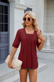 Burgundy textured layered square neckline blouse with short sleeves.