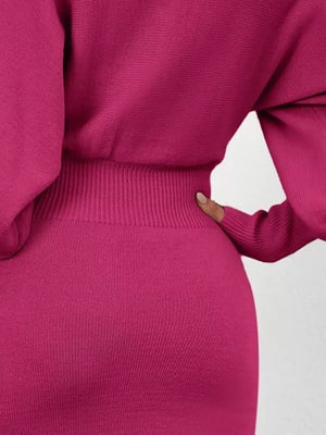 Rose red acrylic bodycon sweater dress with dramatic lantern sleeves and ribbed waist detail.