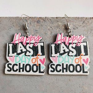 Graduation drop earrings with "Happy Last Day of School" text and heart details.