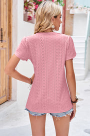 Pink perforated eyelet V-neck flutter sleeve blouse with boho detailing.