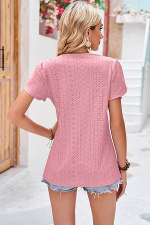 Pink perforated eyelet V-neck flutter sleeve blouse with boho detailing.