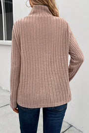 Mocha ribbed knit top with a high neckline and long sleeves.