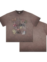 Mocha vintage wash graphic tee with distressed graffiti print and crew neck.