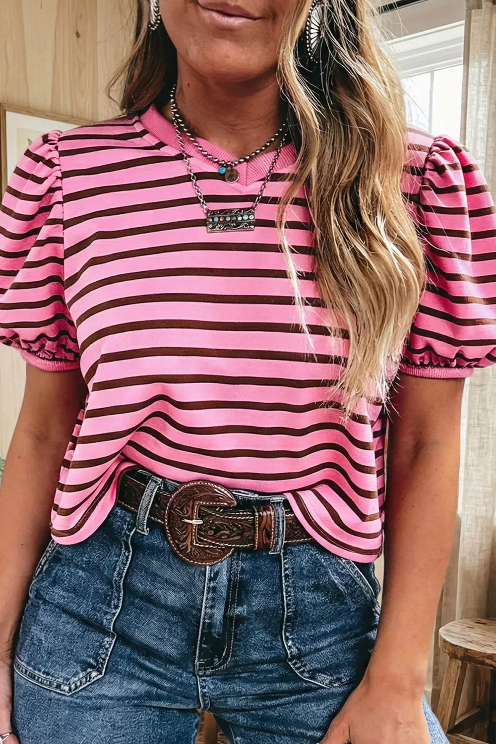 Vibrant striped crew neck t-shirt with puff sleeves in pink and brown cotton blend.