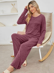 Deep purple ribbed knit loungewear set with long sleeves, crew neck, and pocket detail.