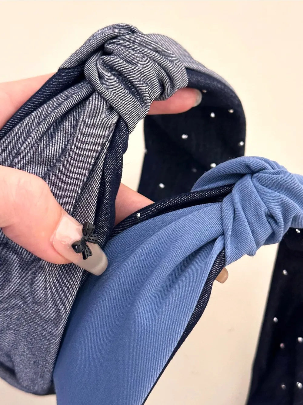 Denim knot headband with crystal detail in medium and dark gray